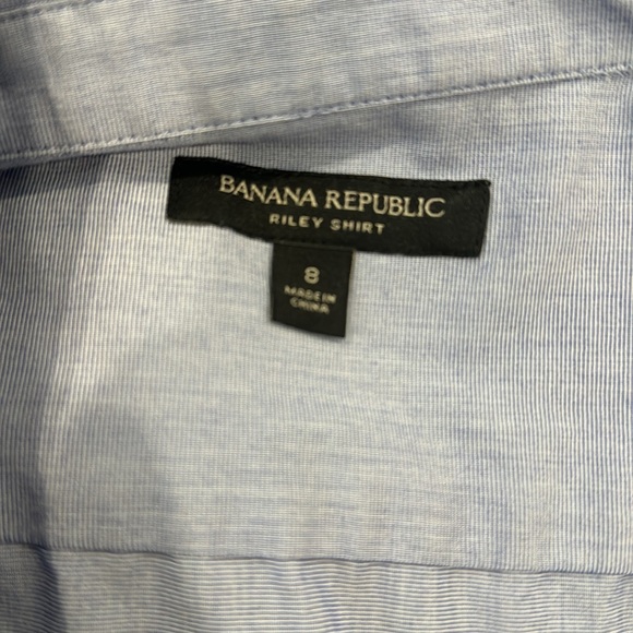 Blue sleeveless Riley shirt. - Picture 2 of 4